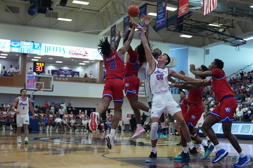 BOCA RATON, FL - FEBRUARY 11: Florida Atlantic Owls center Vladislav Goldin (50) tips the rebound to a teammate who converts a three pointer during the game between the Louisiana Tech Bulldogs and the Florida Atlantic (FAU) Owls on Saturday, February 11, 2023 at FAU Arena in Boca Raton, Fla. (Photo by Peter Joneleit/Icon Sportswire via Getty Images)