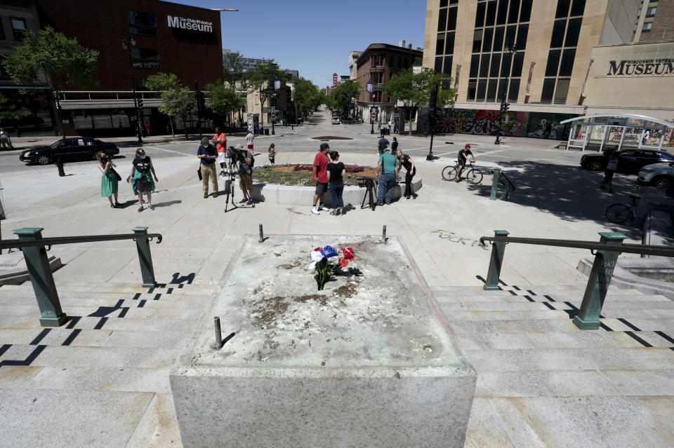A pedestal where the Forward statue once stood sits empty, Wednesday, June, 24, 2020, in Madison, Wis. Protesters tore down statues of Forward and a Union Civil War colonel. They also assaulted a state senator and damaged the Capitol, Tuesday night after the arrest of a Black activist earlier in the day. (Steve Apps/Wisconsin State Journal via AP)