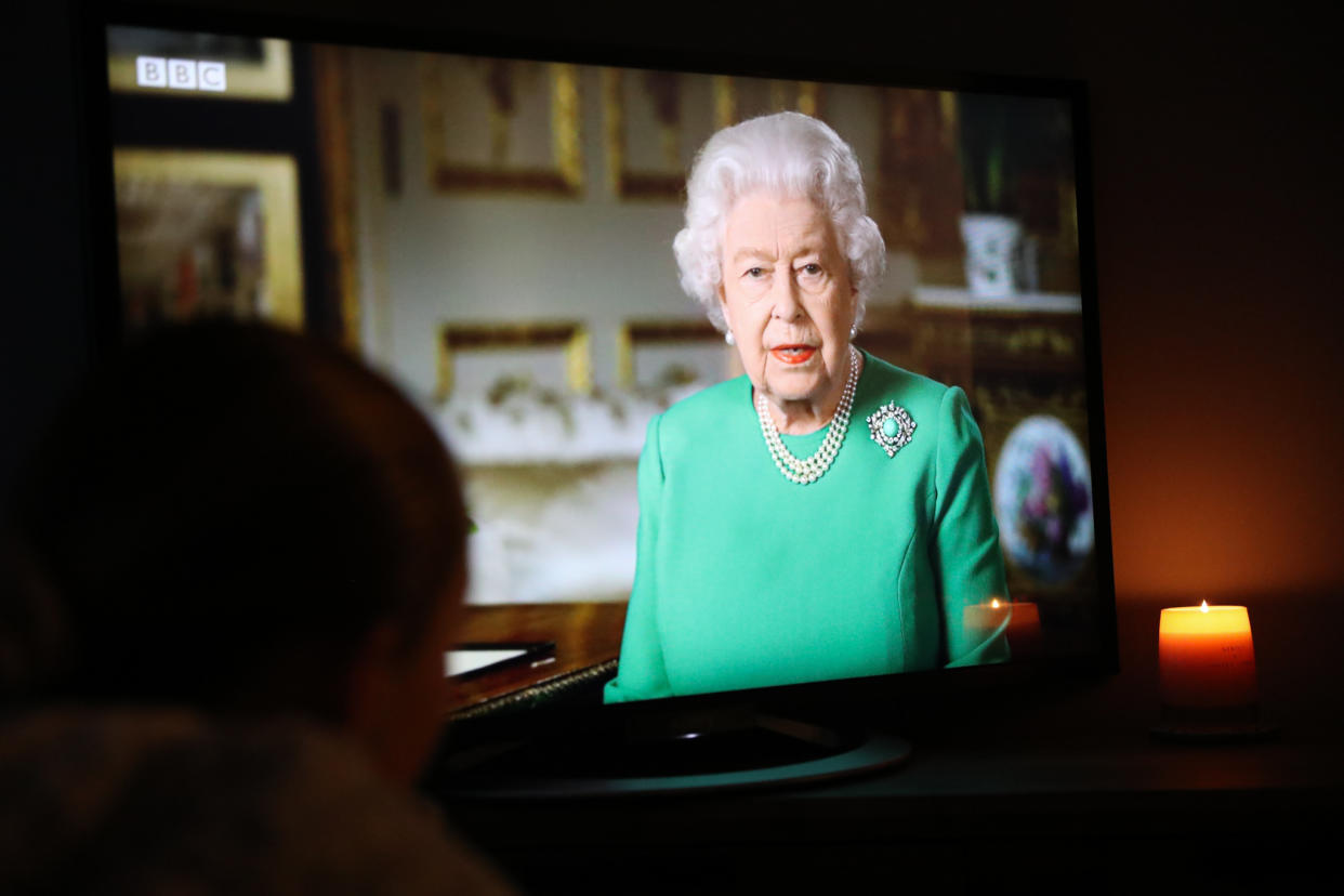 Mia Wilson, aged 12 from Derbyshire watches Queen Elizabeth II deliver her address to the nation and the Commonwealth in relation to the coronavirus epidemic. (Photo by Scott Wilson/PA Images via Getty Images)