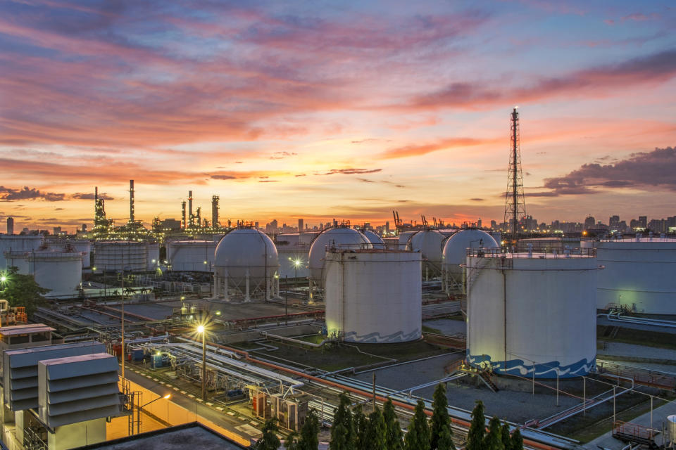 Refinery at twilight with a beautiful sky in the background.