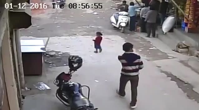 The four-year-old was seen wandering towards the intersection before the frightening incident. Photo: Screenshot