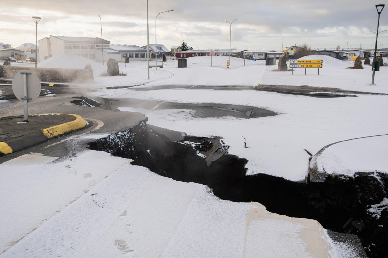 A fissure passes through one of Grindavik's central streets