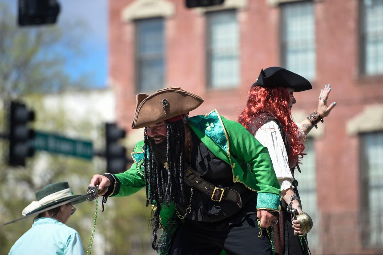 FILE - Participants dressed as pirates celebrate in the St. Patrick’s Day parade in downtown Augusta on Thursday, March 17, 2022. The parade returns Friday.