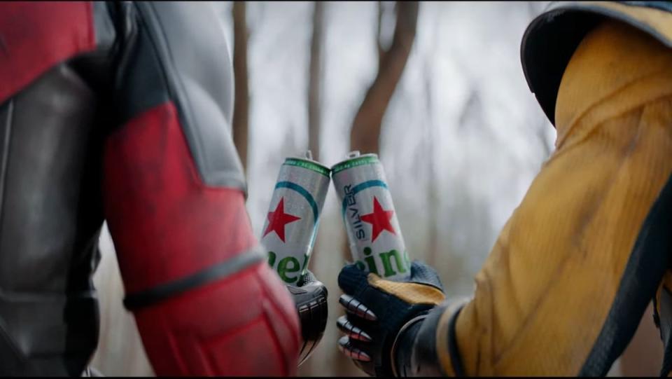 Deadpool and Wolverine  clink beer cans in Heineken ad commercial