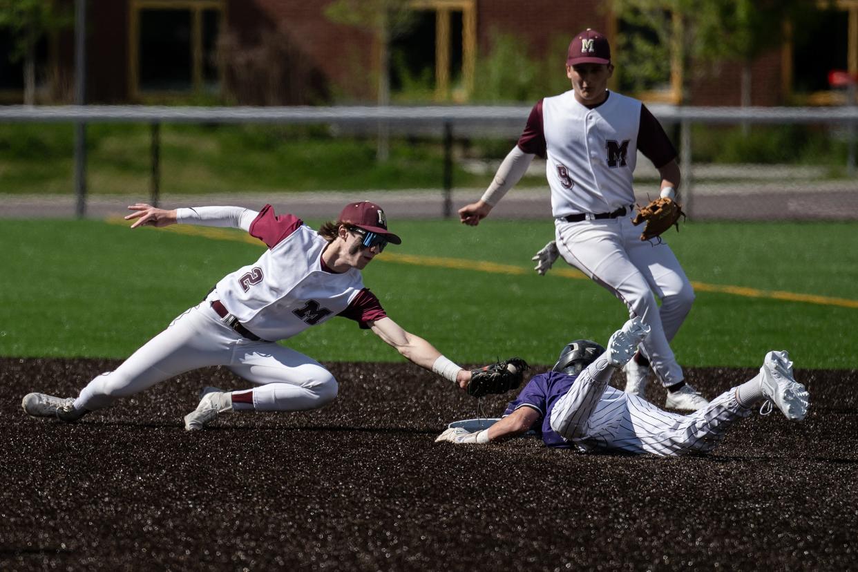 Millbury's Nolan Orzechowski tags out Blackstone Valley Tech's Max Pilkington in the top of the first.