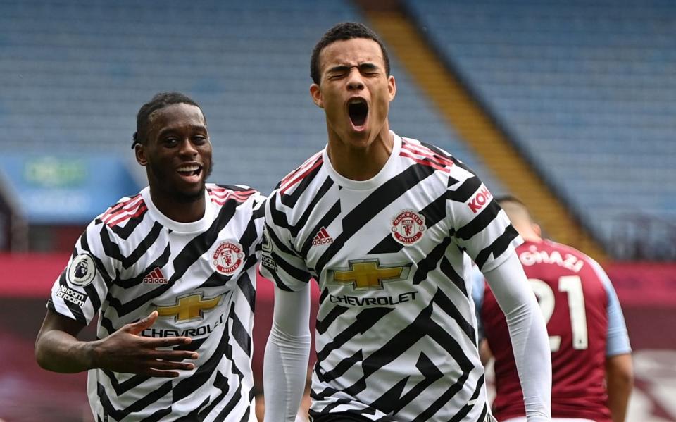 Manchester United's English striker Mason Greenwood (R) celebrates - Getty