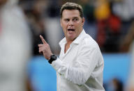 South Africa's coach Rassie Erasmus gestures as his players warm up ahead of the Rugby World Cup Pool B game at the City of Toyota Stadium between South Africa and Namibia in Toyota City, Japan, Saturday, Sept. 28, 2019. (AP Photo/Christophe Ena)