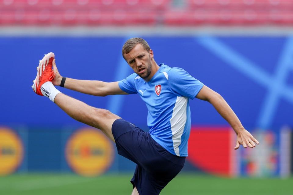 Czechia’s star midfielder Tomas Soucek stretches in training (EPA)