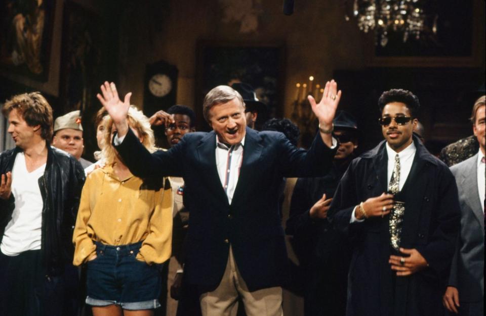 SATURDAY NIGHT LIVE -- Episode 3 -- Pictured: (l-r) George Steinbrenner, Morris Day during "Goodnights" on October 20, 1990 -- (Photo by: Alan Singer/NBCU Photo Bank/NBCUniversal via Getty Images via Getty Images)