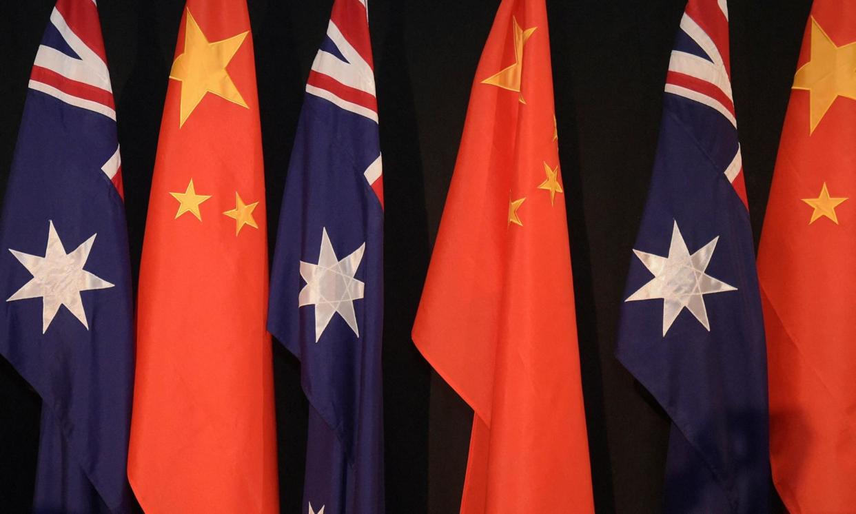 <span>Trade with China has helped underpin Australia’s improved budget position.</span><span>Photograph: Lukas Coch/AFP/Getty Images</span>