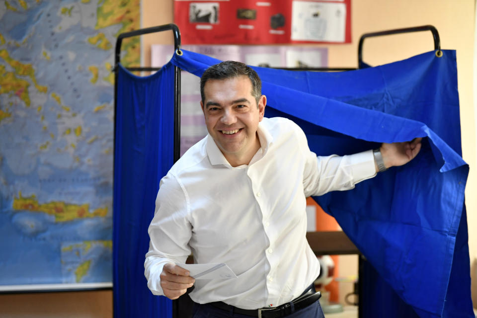 Leader of the main opposition Syriza party, Alexis Tsipras casts his vote at a polling station in Athens, Greece, Sunday, May 21, 2023. Polls have opened in Greece's parliamentary election, the first since the country's economy ceased to be subject to strict supervision and control by international lenders who had provided bailout funds during its nearly decade-long financial crisis. (AP Photo/Michael Varaklas)