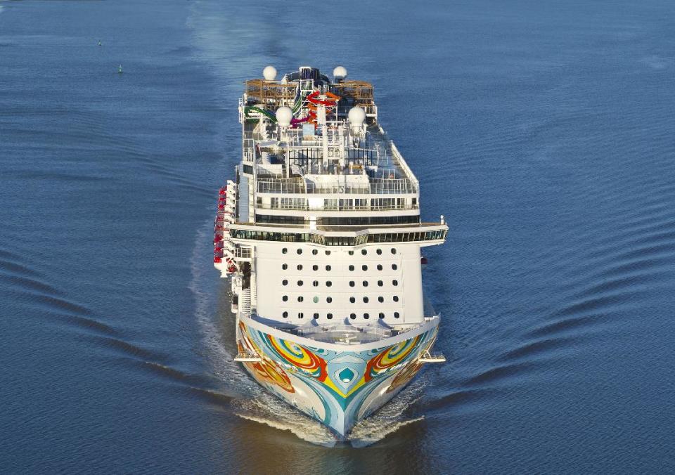 This Nov. 2013 image provided by Norwegian Cruise Line shows the Norwegian Getaway during its debut. It will homeport in Miami and its colorful exterior was designed by Miami-based Cuban-American artist David Le Batard, also known as “LEBO.” Getaway is a sister ship to Norwegian Breakaway, which debuted in 2013 with a New York theme and homeports from Manhattan. (AP Photo/ Norwegian Cruise Line)