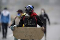 <p>A demonstrator holds a sign that reads in Spanish “Free Venezuela,” during a national sit-in against President Nicolas Maduro, in Caracas, Venezuela, Monday, May 15, 2017. (AP Photo/Fernando Llano) </p>