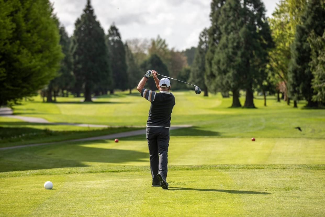 Golfers are pictured at McCleery Golf Course in southwest Vancouver in May 2020. Despite frequent calls to redevelop Vancouver's six public courses, the city's park board voted to largely keep them as is on Monday. (Ben Nelms/CBC - image credit)