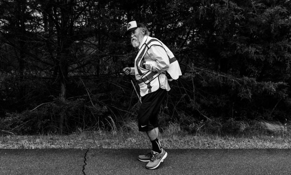 <span>Lazarus Lake attempts his third trans-continental trek.</span><span>Photograph: Hannah Yeost</span>