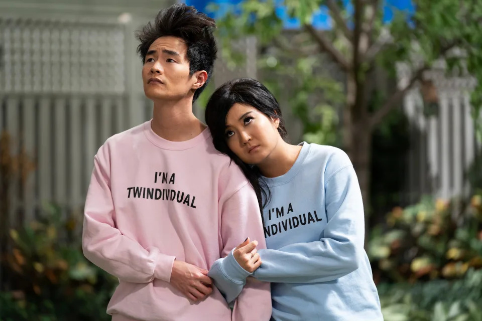 Christopher Larkin and Ashley Park wearing "I'M A TWINDIVIDUAL" crew necks in "Tales of the City"