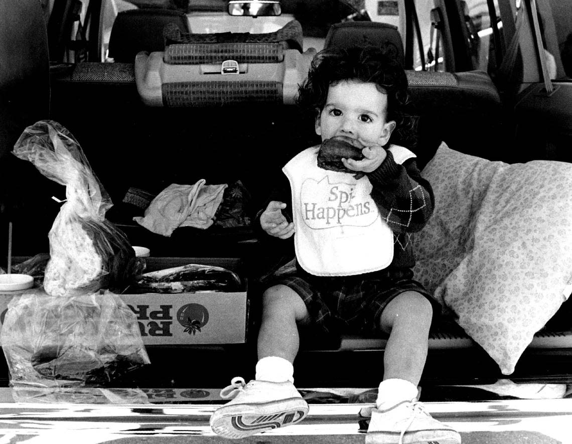 Domenic Taft, then 2, of Coral Gables tries out Knaus Berry Farm’s famous cinnamon buns for the first time in this 1993 file photo. His mom used to come out when she was little and the tradition carried on.