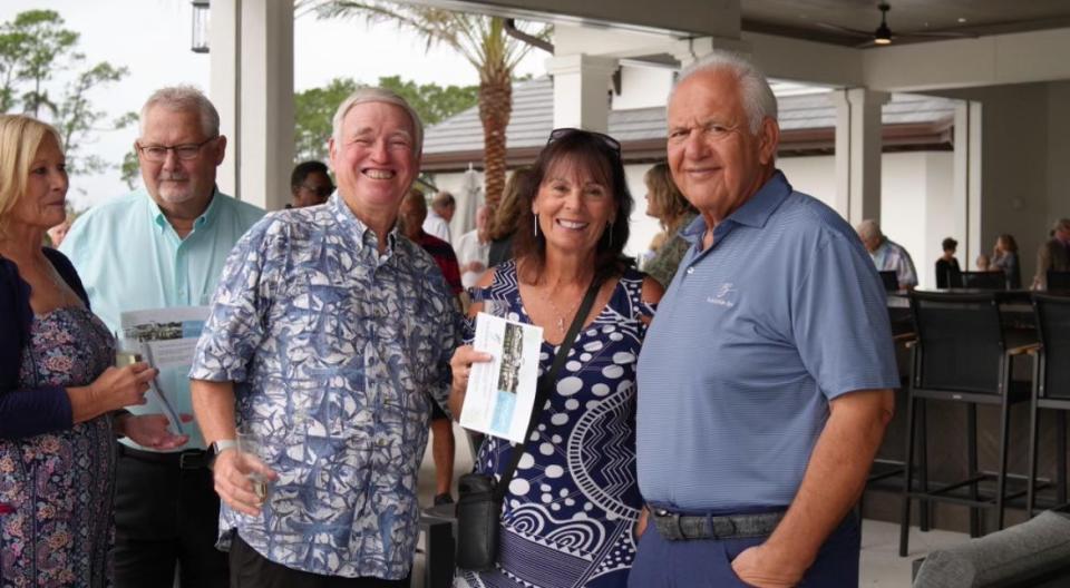 ICI Homes Chairman and CEO Mori Hosseini, right, stands next to Plantation Bay residents Bob and Debbie Richardson and Gary and Nancy Lester at the preview event for the golf community's new Founders Club on Saturday, Dec. 2, 2023. Hosseini developed the $30 million three-story, 40,500-square-foot clubhouse to replace the 14,000-square-foot Club de Bon Mot clubhouse that was built across the street in the 1980s.