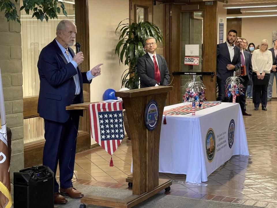 Gary Sandy speaks after taking his oath of office for a second term as 3rd District supervisor during a ceremony outside the Board of Supervisors chambers in January in Woodland. Sandy, who previous served as a city councilman and mayor in Woodland, died Thursday at the age of 68.