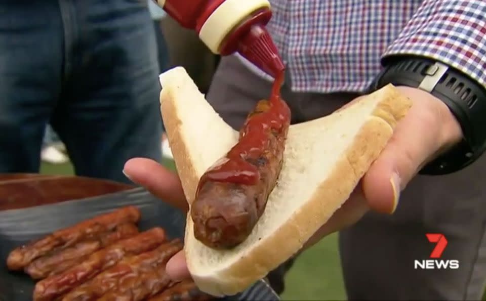 Sausages smothered in tomato sauce on white bread will put your salt levels through the roof. Source: 7 News