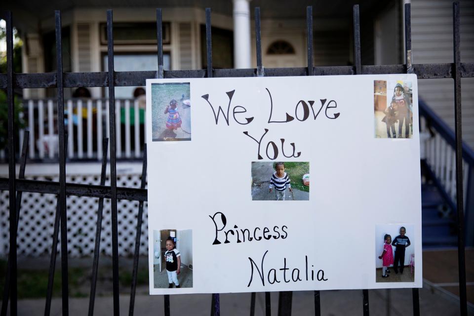 A poster with photos are attached to a fence in the South Austin neighborhood of Chicago on Sunday, July 5, 2020, during a vigil for 7-year-old Natalie Wallace, who was shot and killed as her family gathered to celebrate the Fourth of July holiday Saturday night in the 100 bock of North Latrobe Avenue Kingsbury Street.