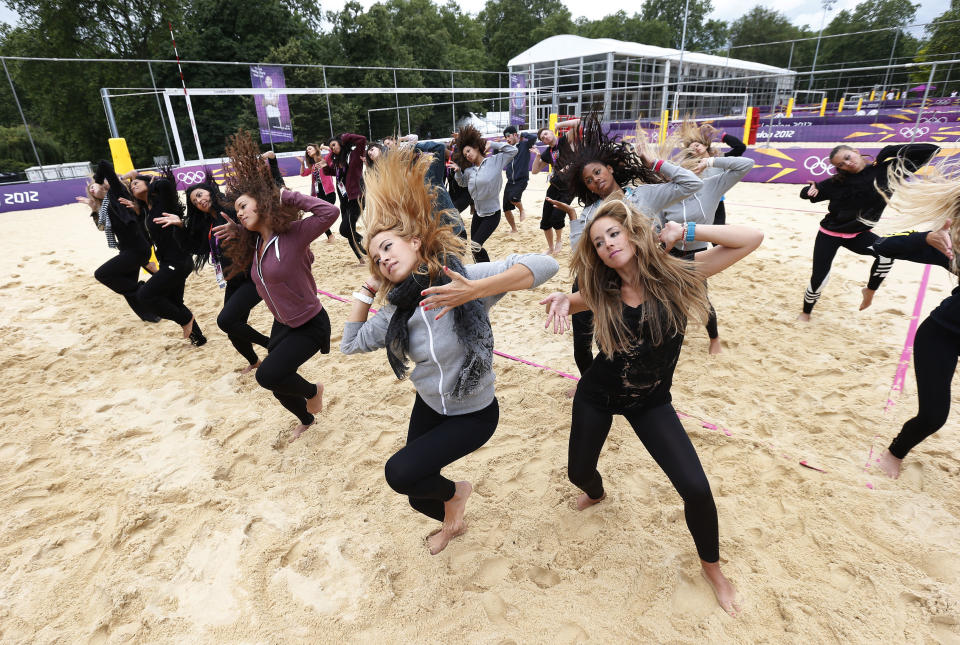 Dancers rehearse at the London 2012 Olympics beach volleyball venue in central London