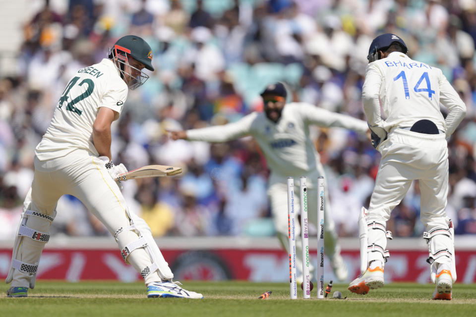 Australia's Cameron Green looks round as he is bowled out by India's Ravindra Jadeja on the fourth day of the ICC World Test Championship Final between India and Australia at The Oval cricket ground in London, Saturday, June 10, 2023. (AP Photo/Kirsty Wigglesworth)