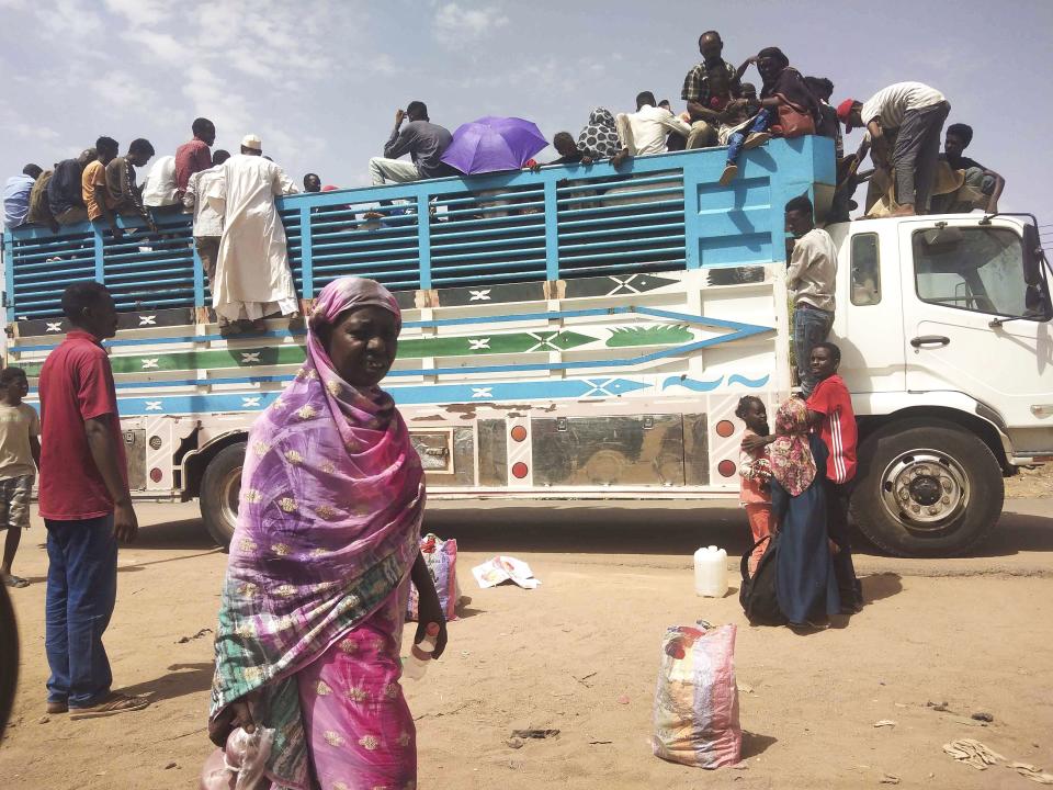 People board a truck as they leave Khartoum, Sudan, on June 19, 2023. A leading human rights group called Friday Aug. 4, 2023 on the United States and the United Nations to impose further sanctions on the Sudanese individuals “responsible for the atrocities” in Darfur, as evidence of scorched-earth attacks mount. The northeast African country plunged into chaos in April when monthslong tensions between the military, led by Abdel Fattah Burhan, and the paramilitary Rapid Support Forces, commanded by Mohammed Hamdan Dagalo, exploded into open fighting in the capital of Khartoum, and elsewhere. | Associated Press