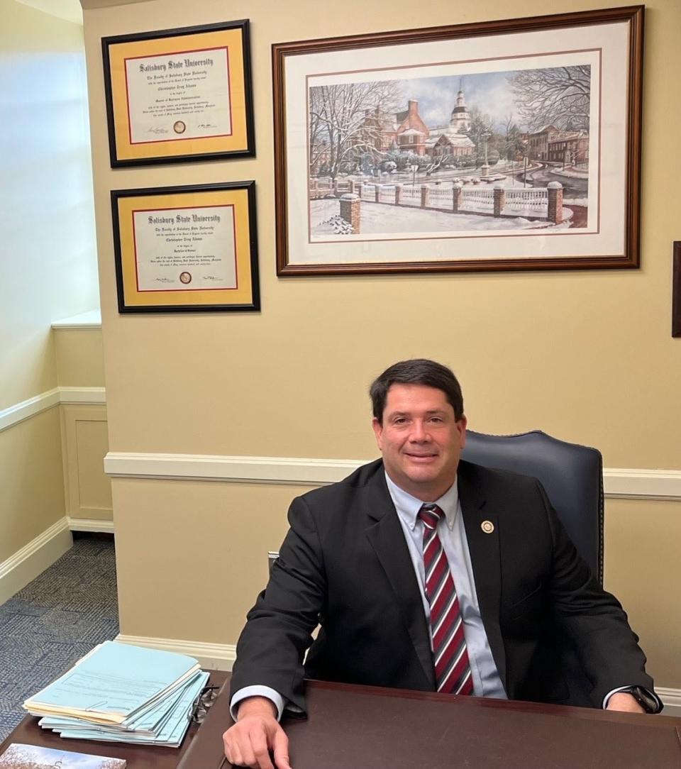 Maryland state Del. Chris Adams, R-Caroline/Dorchester/Talbot/Wicomico, sits in his Annapolis office. At left on his desk are a stack of bills for the 2024 session with his diplomas from Salisbury University on the wall behind him.