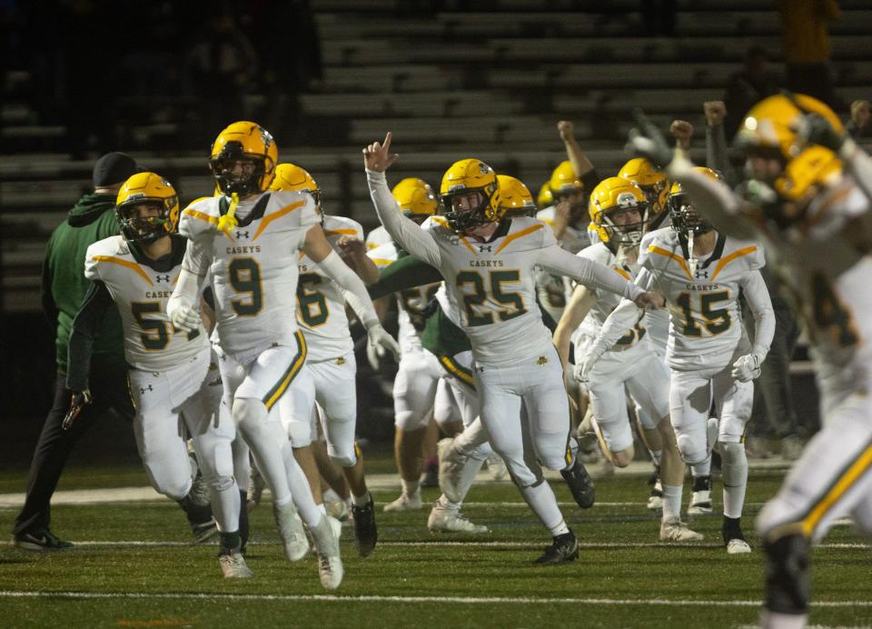 Red Bank Catholic celebrates after its dramatic 35-28 overtime win over Toms River North Friday night.