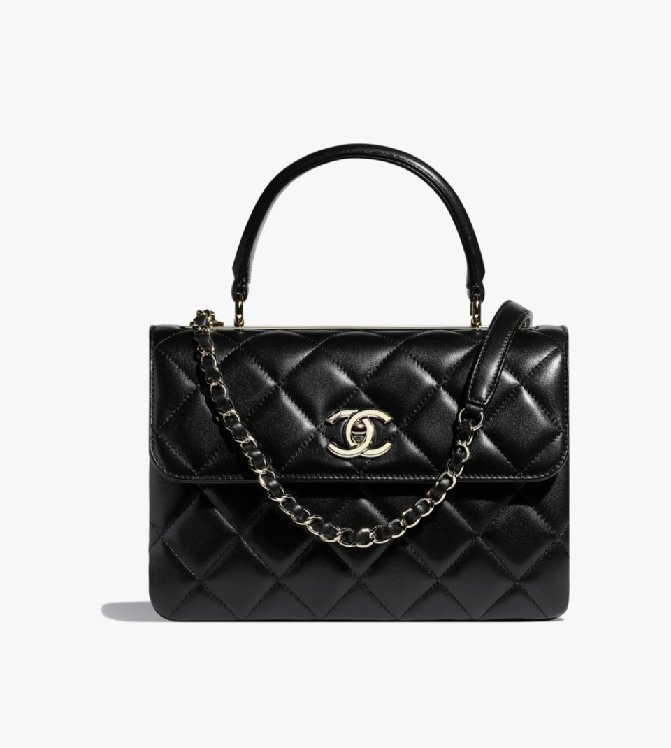 <p><a href="https://go.redirectingat.com?id=74968X1596630&url=https%3A%2F%2Fwww.chanel.com%2Fus%2Ffashion%2Fp%2FA92236Y6076794305%2Fflap-bag-with-top-handle-lambskin-gold-tone-metal%2F&sref=https%3A%2F%2F" rel="nofollow noopener" target="_blank" data-ylk="slk:Shop Now;elm:context_link;itc:0;sec:content-canvas" class="link ">Shop Now</a></p><p>Flap Bag with Top Handle</p><p>chanel.com</p><p>$6900.00</p><span class="copyright">Chanel</span>