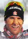 Devon Kershaw of Canada celebrates his victory at the FIS World Cup Cross-country men 15 km free mass start competition in Rybinsk, on February 4, 2012. AFP PHOTO / NATALIA KOLESNIKOVA