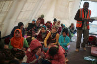 Displaced Iraqi children attend a class in a tent school set by United Nations Children's Fund (UNICEF) at Hassan Sham camp, east of Mosul, Iraq December 8, 2016. REUTERS/Mohammed Salem