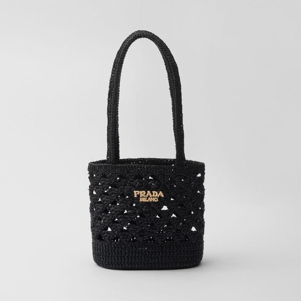 <p><a href="https://go.redirectingat.com?id=74968X1596630&url=https%3A%2F%2Fwww.prada.com%2Fus%2Fen%2Fp%2Fwoven-fabric-crochet-tote-bag%2F1BG494_2M2T_F0ES7_V_OOO%3Fs_kwcid%3DAL%25218549%25213%2521%2521%2521%2521x%2521%2521%26gad_source%3D1%26gclid%3DCjwKCAjwoPOwBhAeEiwAJuXRh3kIEYG09Qh1LfiQ1Vjb4xXo8B7z60GUbmU3vwFGwgegLY00DX6mIhoCm5IQAvD_BwE%26gclsrc%3Daw.ds&sref=https%3A%2F%2Fwww.elle.com%2Ffashion%2Faccessories%2Fg60500171%2Fbest-raffia-bags-women%2F" rel="nofollow noopener" target="_blank" data-ylk="slk:Shop Now;elm:context_link;itc:0;sec:content-canvas" class="link ">Shop Now</a></p><p>Black Woven Crochet Tote Bag</p><p>prada.com</p><p>$1750.00</p>