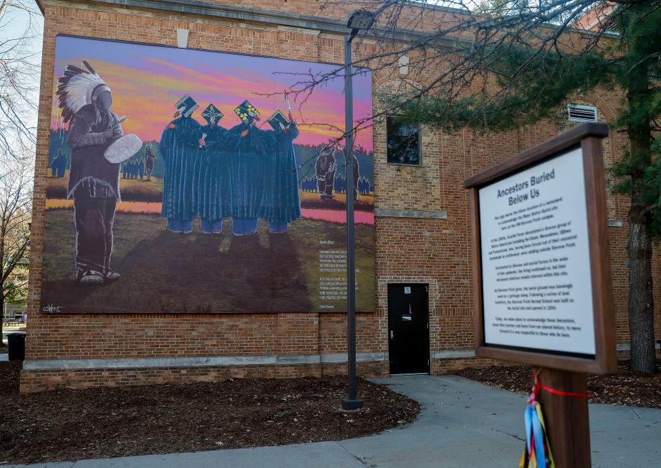 A memorial mural is seen on Thursday, April 13, 2023, on the campus of the University of Wisconsin-Stevens Point in Stevens Point, Wis. The mural is meant to bring attention and honor to the approximately 80 Indigenous people beneath the campus, who had died during a scarlet fever epidemic in the 1860s.
(Photo: Tork Mason, USA Today NETWORK-Wisconsin)