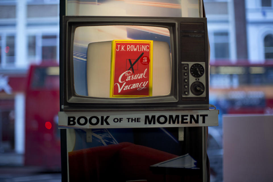 A copy of the "The Casual Vacancy" by author J.K. Rowling is displayed at a book store in London, Thursday, Sept. 27, 2012. British bookshops are opening their doors early as Harry Potter author J.K. Rowling launches her long anticipated first book for adults. Publishers have tried to keep details of the book under wraps ahead of its launch Thursday, but "The Casual Vacancy" has gotten early buzz about references to sex and drugs that might be a tad mature for the youngest "Potter" fans. (AP Photo/Matt Dunham)