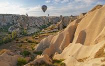 <p>Cappadocia is the “<a rel="nofollow noopener" href="http://www.goreme.com/horseback-riding-tours.php" target="_blank" data-ylk="slk:Land of Beautiful Horses;elm:context_link;itc:0;sec:content-canvas" class="link ">Land of Beautiful Horses</a>,” so you should explore the <a rel="nofollow noopener" href="https://www.tripadvisor.com/Attractions-g297980-Activities-c61-t62-Cappadocia.html" target="_blank" data-ylk="slk:landscape by horse;elm:context_link;itc:0;sec:content-canvas" class="link ">landscape by horse</a> as well as by hot air balloon. While you’re on the ground, don’t forget to indulge in <a rel="nofollow noopener" href="http://www.timeout.com/travel/features/693/winemaking-in-cappadocia" target="_blank" data-ylk="slk:wine tasting;elm:context_link;itc:0;sec:content-canvas" class="link ">wine tasting</a>.</p>