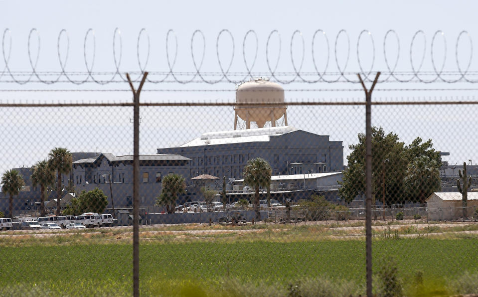 FILE - This July 23, 2014, file photo shows the closed Florence State Prison, a state prison in Florence, Ariz. The number of inmates in Arizona's prisons and in some county jails in the state have decreased since the start of pandemic. The decrease reflects a slowdown in the state's court system that has held far fewer criminal jury trials over the last year as it took steps to prevent the coronavirus from spreading at courthouses. (AP Photo/File)