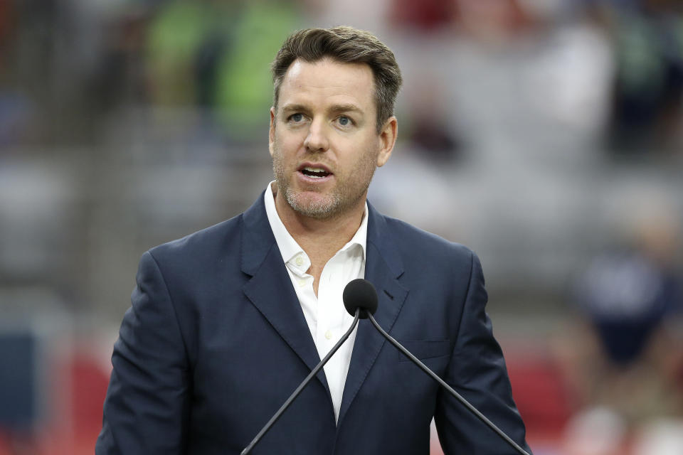 Former Arizona Cardinals quarterback Carson Palmer speaks after being added to the Cardinals ring of honor at half time of an NFL football game against the Seattle Seahawks, Sunday, Sept. 29, 2019, in Glendale, Ariz. (AP Photo/Ross D. Franklin)