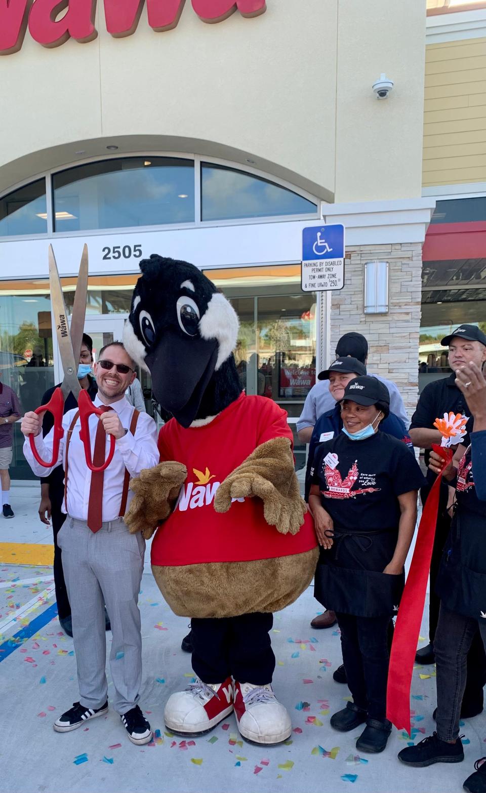 Wawa's mascot, Wally Goose, joins customers at a celebratory opening in this file photo