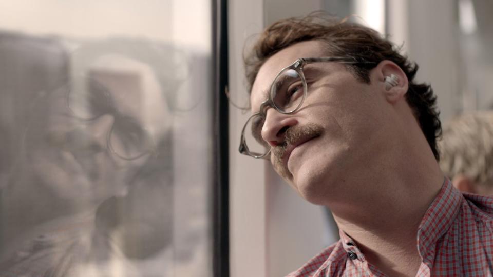 Joaquin Phoenix in the 2013 film “Her.” Courtesy of Warner Bros. Picture