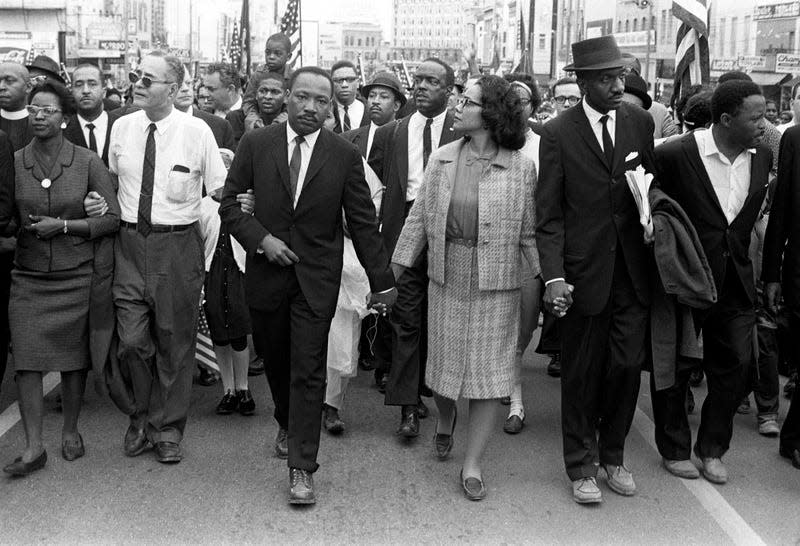 Dr. Martin Luther King, Jr. arrives in Montgomery, Alabama on March 25th 1965 at the culmination of the Selma to Montgomery March. Pictured from left, Ralph Bunche, Dr. Martin Luther King, Jr., Coretta Scott King, Rev. Fred Shuttlesworth, Hosea Williams.