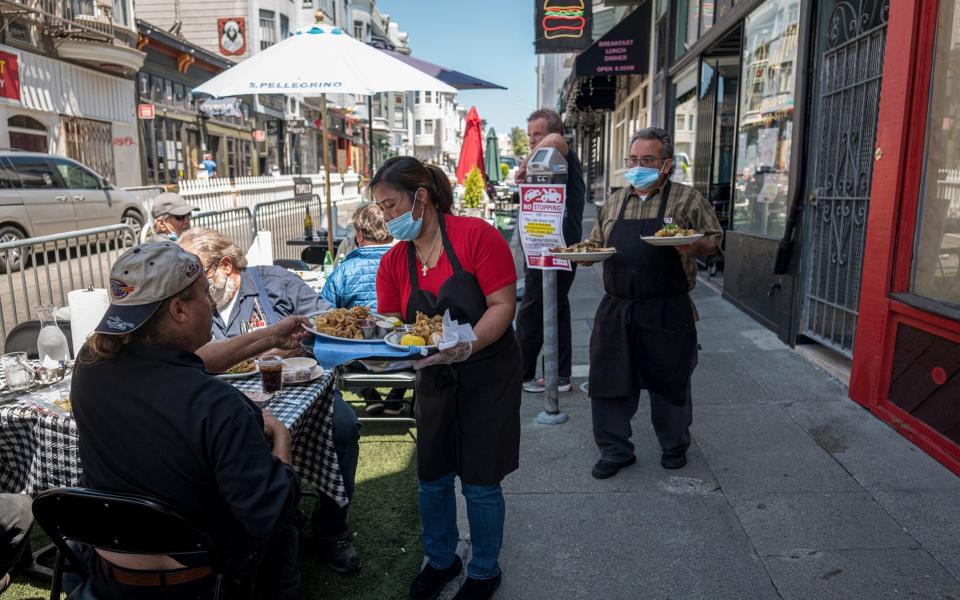 A restaurant in San Francisco. Eateries had only recently started to reopen in the state - BLOOMBERG