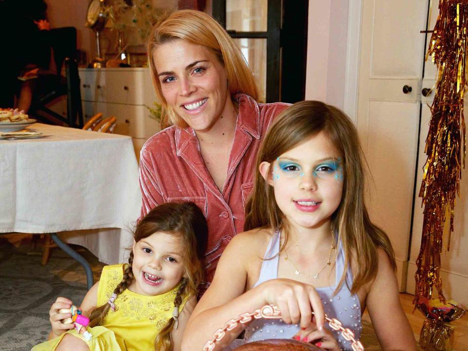 <p>Rich Fury/Getty</p> Busy Philipps and her daughters Birdie Leigh and Cricket Pearl Silverstein