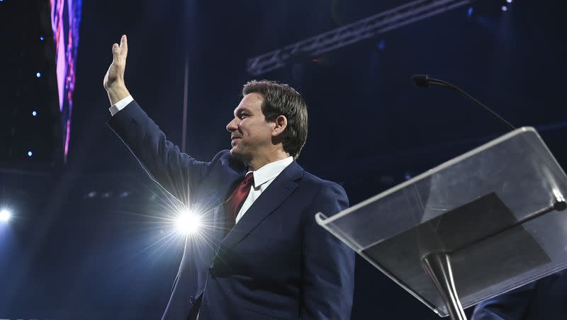 Florida Gov. Ron DeSantis waves to the audience during convocation at Liberty University, in Lynchburg, Va., on Friday, April 14, 2023.