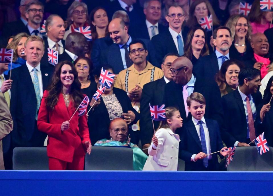 Kate, Princess of Wales and her children Prince George and Princess Charlotte during the concert at Windsor Castle. (AP)