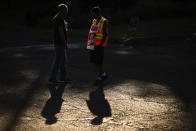 Workers Mike Jones, left, and Joel Inocencio, demonstrative outside a General Motors facility in Langhorne, Pa., Tuesday, Sept. 17, 2019. More than 49,000 members of the United Auto Workers walked off General Motors factory floors or set up picket lines early Monday as contract talks with the company deteriorated into a strike. (AP Photo/Matt Rourke)