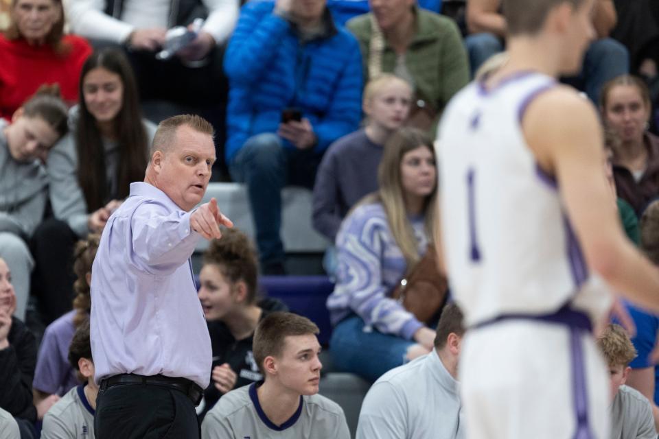 Coach Quincy Lewis points to his son, Cooper Lewis, after he made a basket during a game against Pleasant Grove at Lehi High School in Lehi on Friday, Jan. 26, 2024. Lehi won 77-61. | Marielle Scott, Deseret News