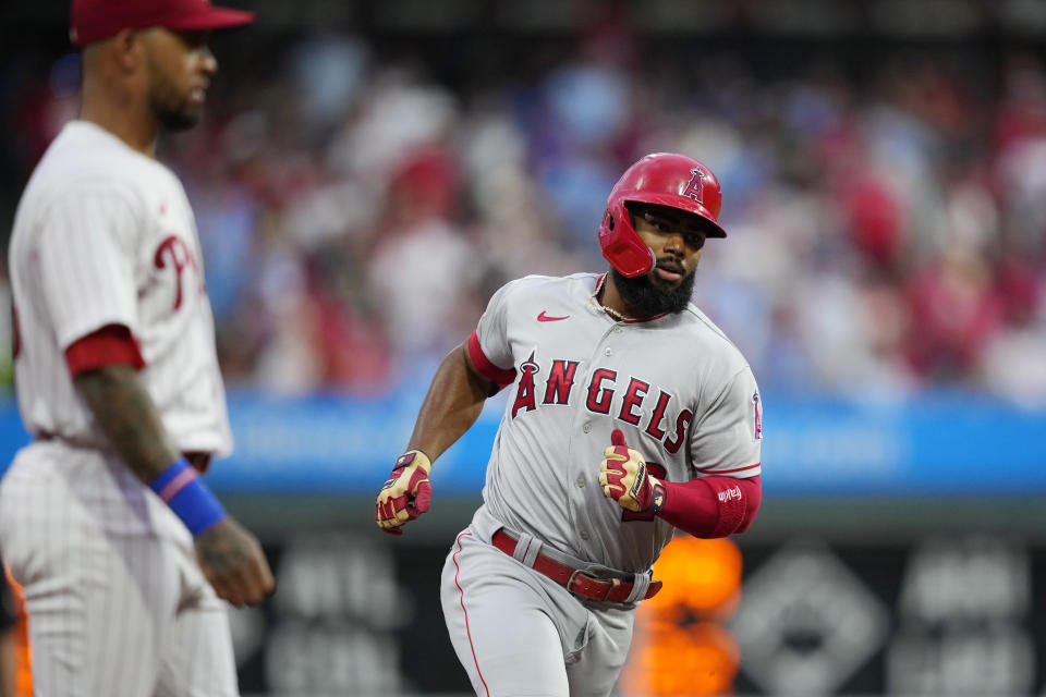 Los Angeles Angels' Luis Rengifo, right, rounds the bases after hitting a home run against Philadelphia Phillies pitcher Michael Lorenzen during the second inning of a baseball game, Tuesday, Aug. 29, 2023, in Philadelphia. (AP Photo/Matt Slocum)