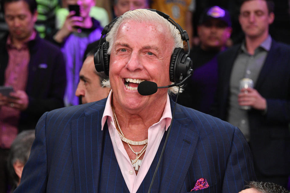 LOS ANGELES, CALIFORNIA - FEBRUARY 25: Ric Flair joins a telecast during a basketball game between the Los Angeles Lakers and the New Orleans Pelicans at Staples Center on February 25, 2020 in Los Angeles, California. (Photo by Allen Berezovsky/Getty Images)